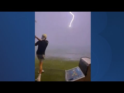 Lightning strike hits golf ball in mid-air